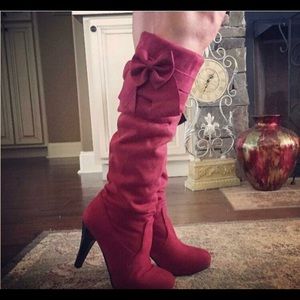 Knee High red boots. Feel like suede. New